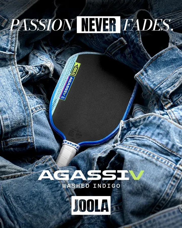 Cây vợt Agassi Pro V Washed Indigo đặt giữa đống quần bò cùng dòng chữ PASSION NEVER FADES